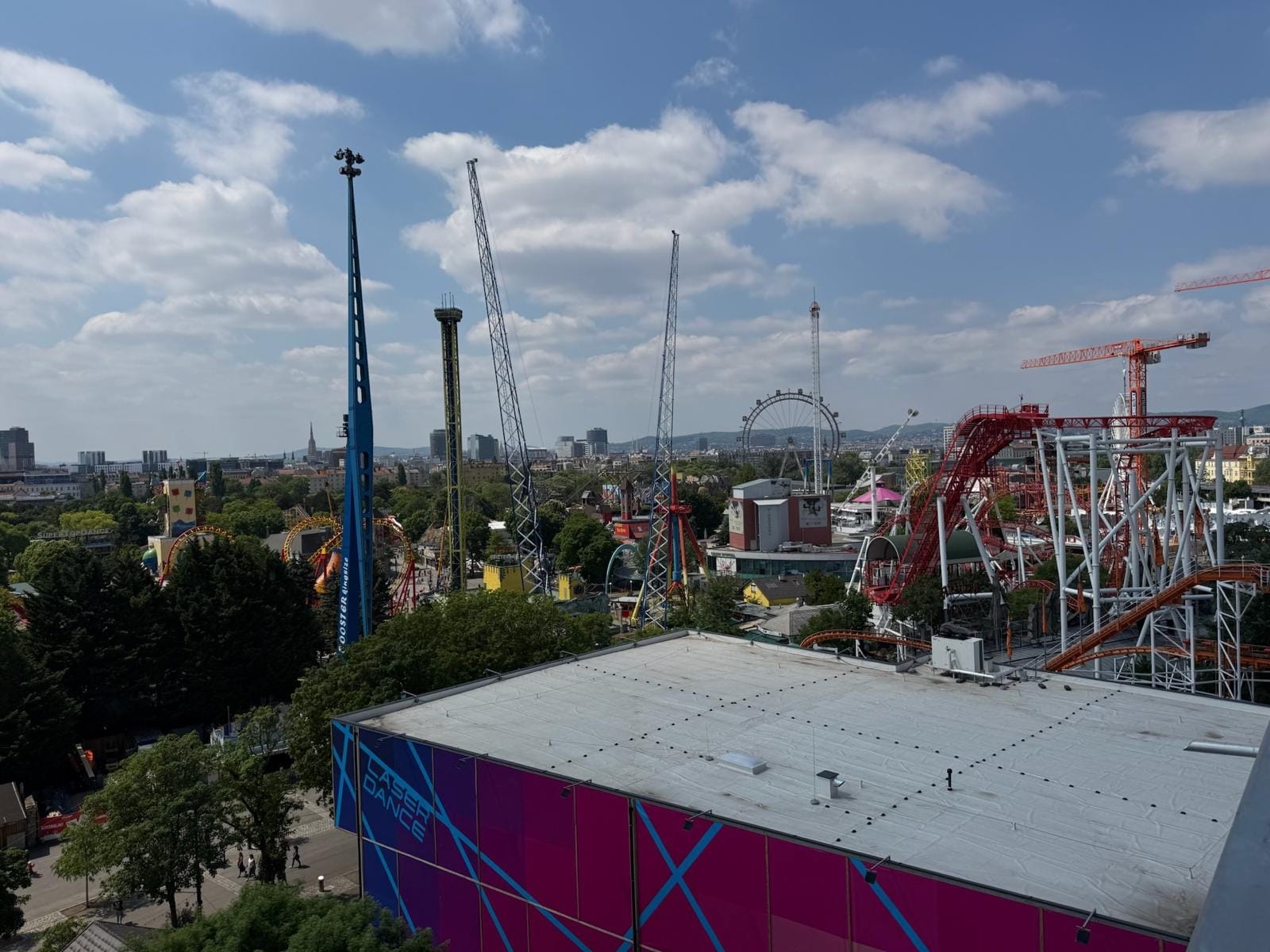 View from Superbude over the Prater with its rides and the Giant Ferris Wheel